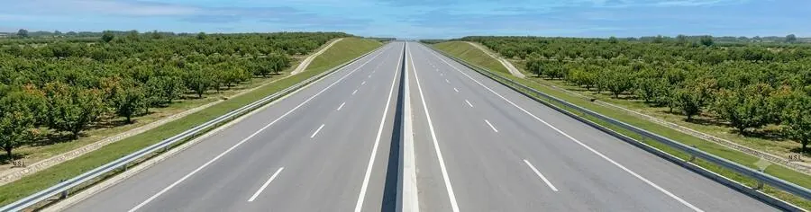 Swat Motorway photograph, dual carriageway through orchards